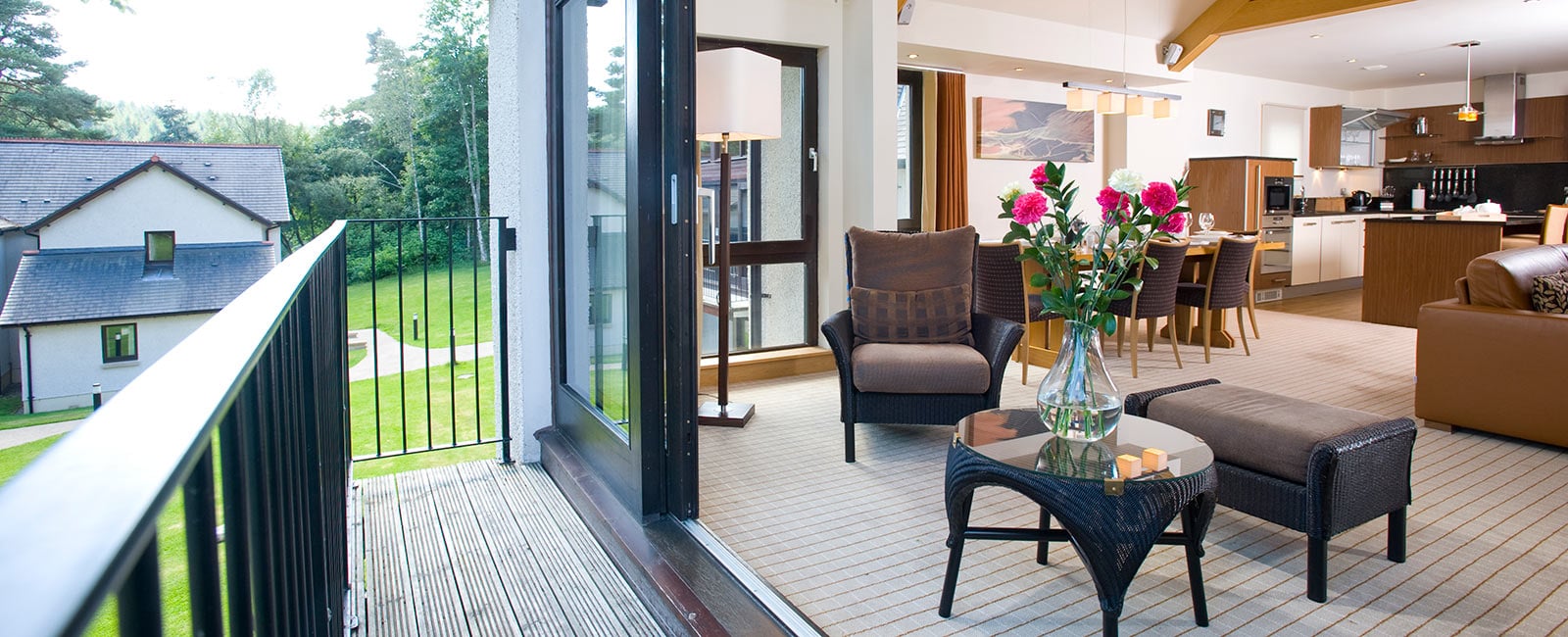 Dining Area and Terrace at Dunkeld House Lodges, Managed by Hilton Grand Vacations in Perthshire, Scotland